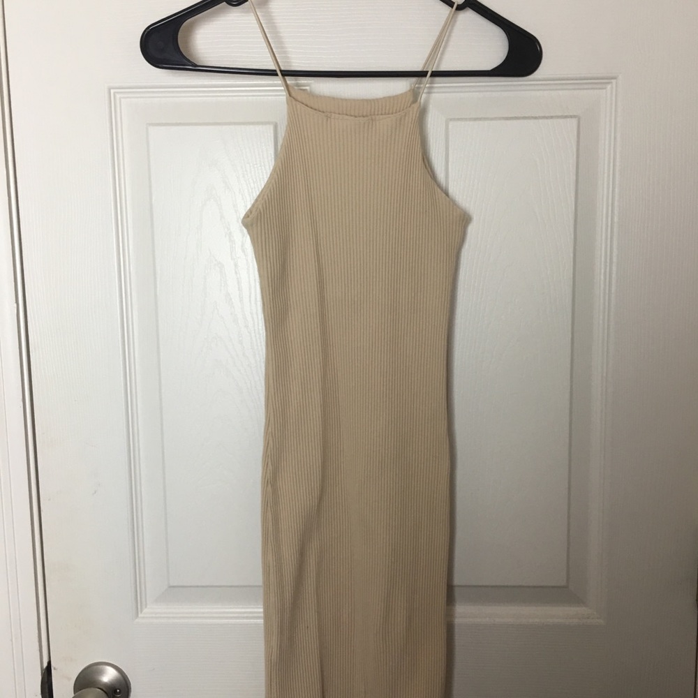 Nude dress with high neckline